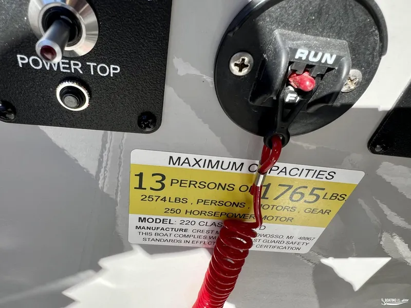 Slide: The Image of 2023 Crest Classic Platinum 220 SLS capacity label, showing 13-person, 1765 lbs limit. - 9