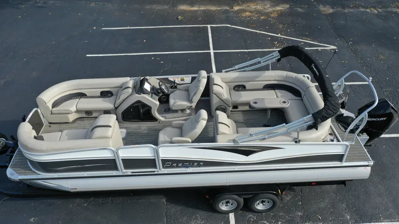 Slide: The Image of 2022 Premier 250 Solaris RF pontoon boat with spacious seating and modern design. - 6
