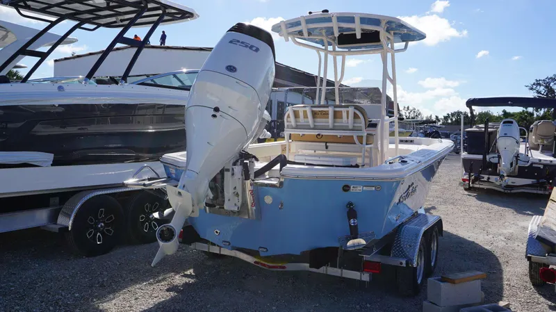 Slide: The Image of 2023 Sea Chaser 23 LX boat with 250 HP outboard motor on trailer. - 13