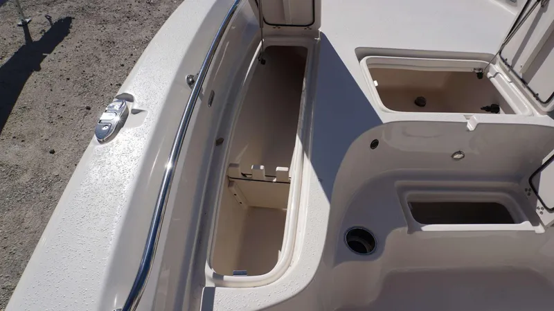 Slide: The Image of 2023 Sea Chaser 23 LX boat storage compartments and deck details. - 7