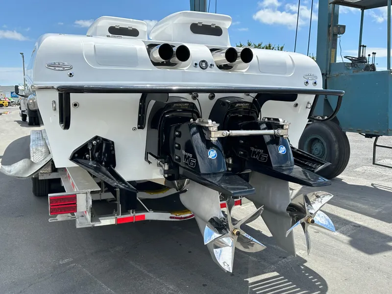 Slide: The Image of 2003 Outerlimits 47 GTX boat with dual propellers and powerful engines. - 15