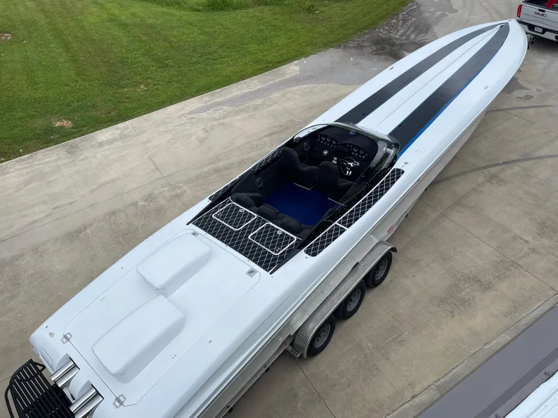 Slide: The Image of 2003 Outerlimits 47 GTX speedboat on trailer, aerial view. - 21
