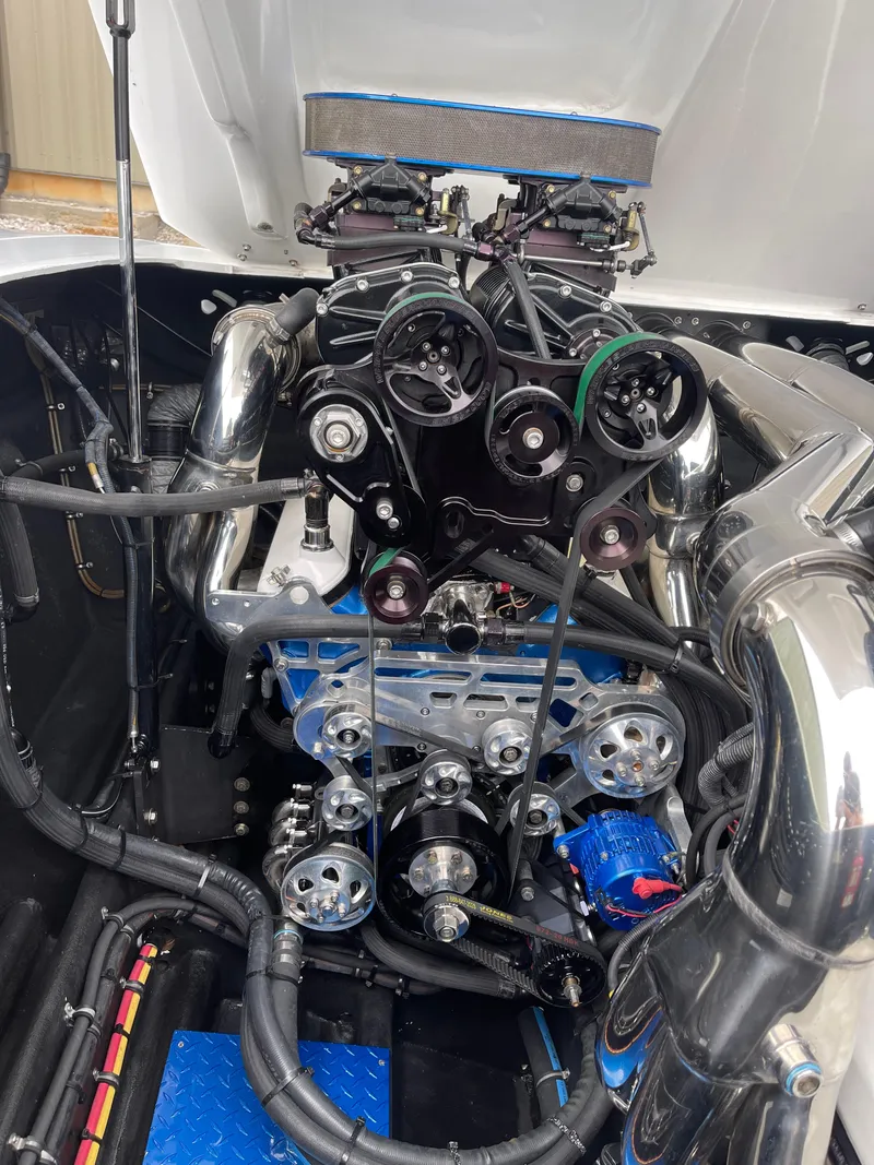 Slide: The Image of 2003 Outerlimits 47 GTX engine, detailed view of components and mechanics. - 34