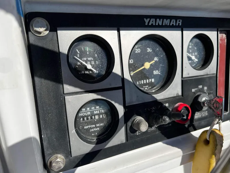 Slide: The Image of Yanmar engine control panel on a 1992 Robertson Custom Catamaran / Sloop Rig. - 25