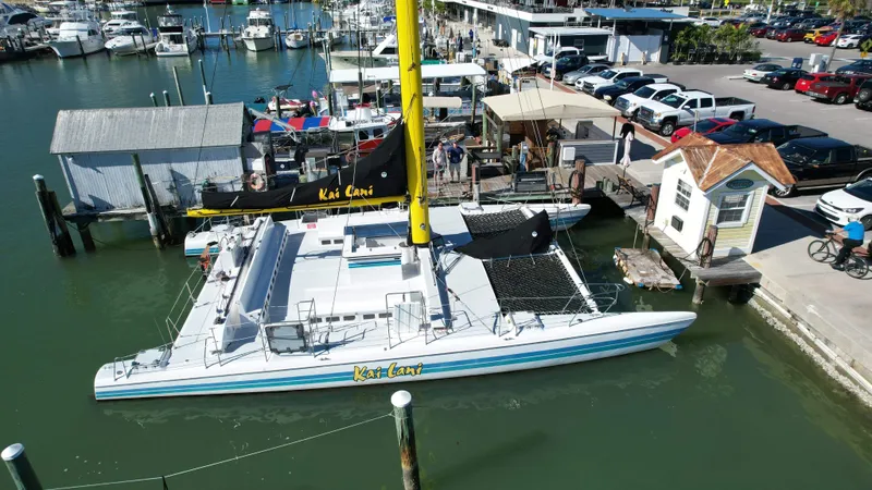 Slide: The Image of 1992 Robertson Custom Catamaran Sloop Rig docked at marina, named Kai Lani. - 7