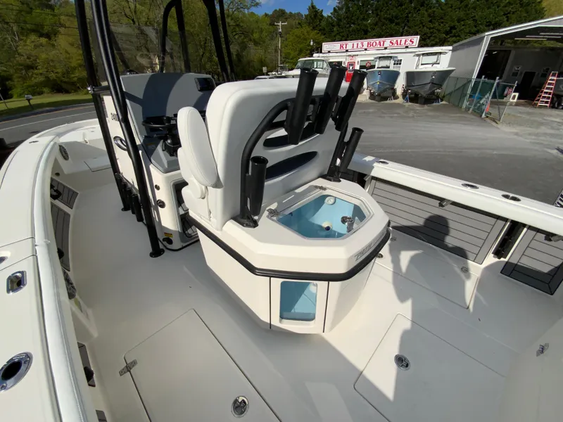 Slide: The Image of 2024 Pathfinder 2400 Open boat interior with seating and storage. - 13