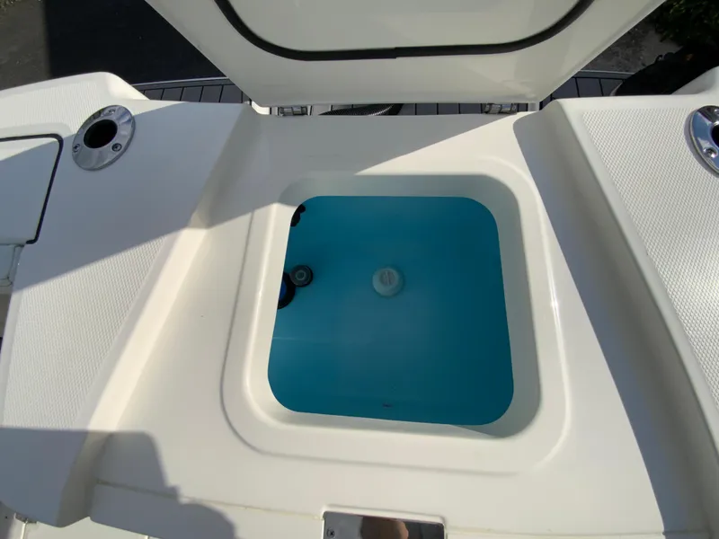 Slide: The Image of Livewell compartment on a 2024 Pathfinder 2400 Open boat. - 21