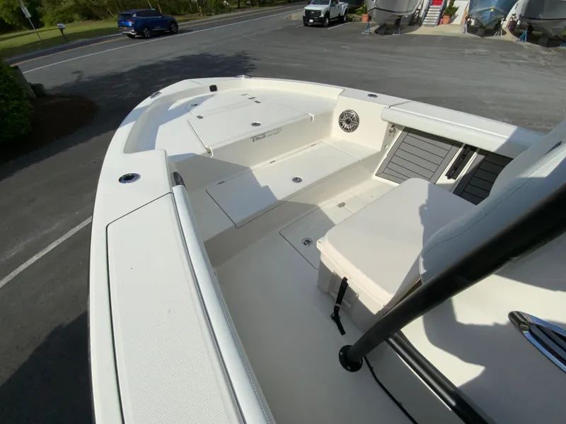 Slide: The Image of 2024 Pathfinder 2400 Open boat interior, spacious deck and seating. - 23