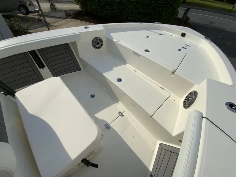 Slide: The Image of 2024 Pathfinder 2400 Open boat interior with seating and storage compartments. - 24