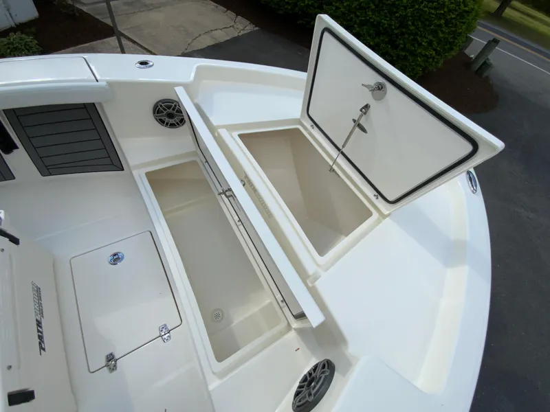 Slide: The Image of 2024 Pathfinder 2400 Open boat with open storage compartments. - 25