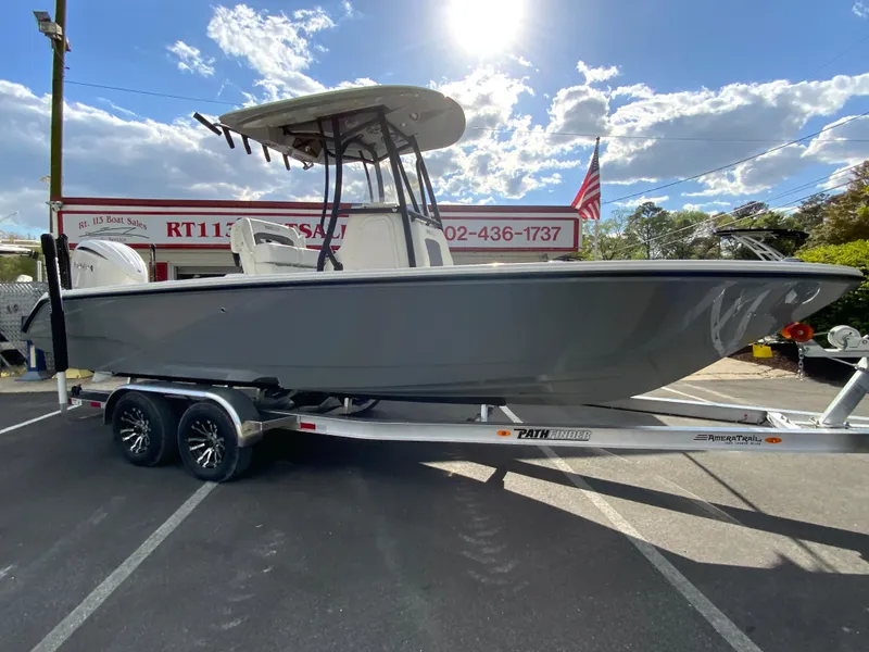 Slide: The Image of 2024 Pathfinder 2400 Open boat on trailer in dealership lot. - 3