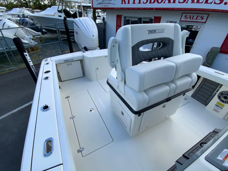 Slide: The Image of 2024 Pathfinder 2400 Open boat interior at a sales lot. - 32