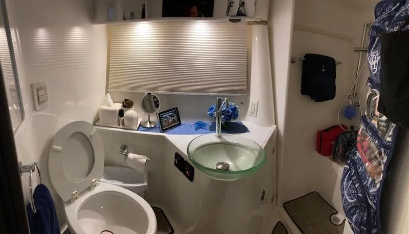 Slide: The Image of 2018 Cobalt A40 Coupe bathroom with modern fixtures and glass sink. - 18