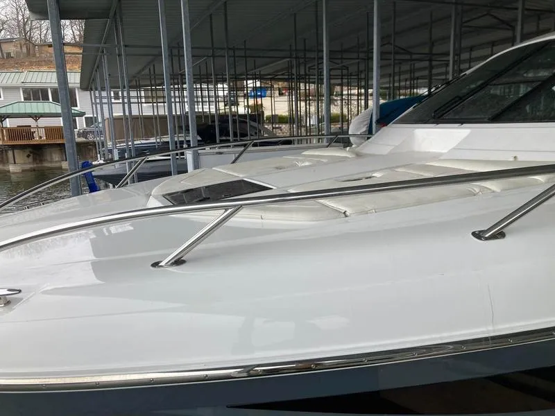Slide: The Image of 2018 Cobalt A40 Coupe boat docked in a covered marina. - 26