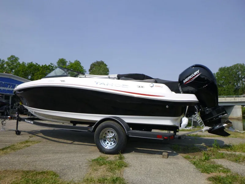 Slide: The Image of 2023 Tahoe 200 S boat on trailer with Mercury outboard motor. - 2