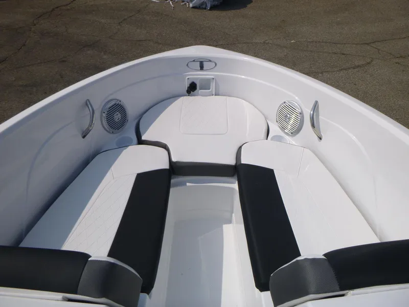 Slide: The Image of 2023 Tahoe 200 S boat interior with white and black seating. - 8