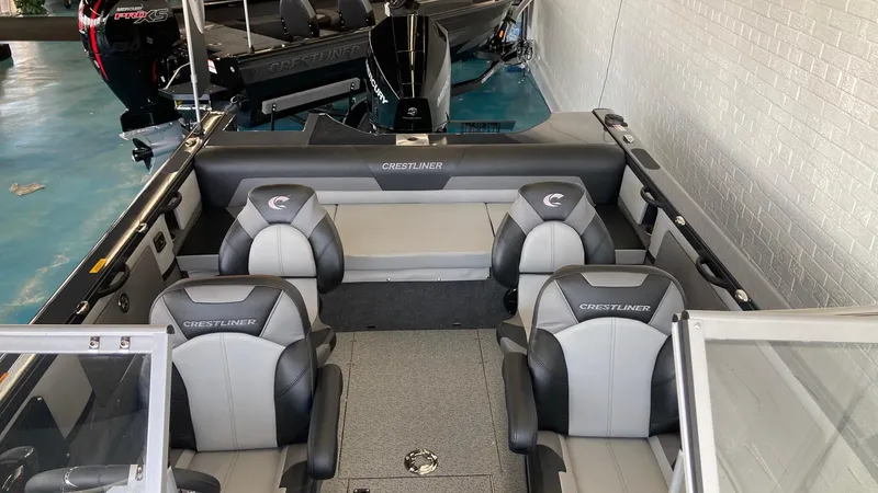 Slide: The Image of 2024 Crestliner 2050 Sportfish boat interior with four seats and spacious layout. - 4