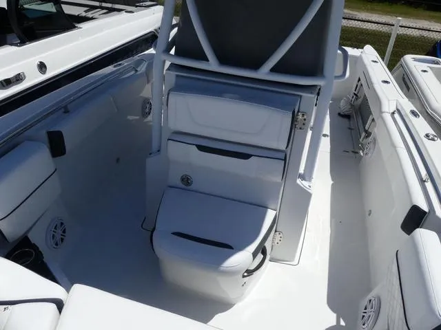Slide: The Image of 2022 Blackfin 252CC boat interior with white seating and modern design. - 12
