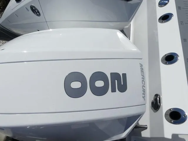 Slide: The Image of 2022 Blackfin 252CC boat with Mercury engine, top view. - 5