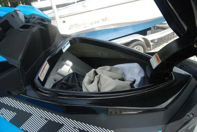 Slide: The Image of 2018 Sea-Doo Waverunner GTR storage compartment with open lid. - 5