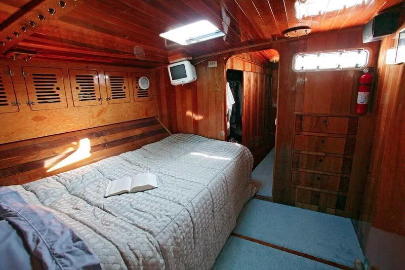 Slide: The Image of Luxurious wooden cabin interior of a 1996 Custom 100' Sailing Yacht. - 13