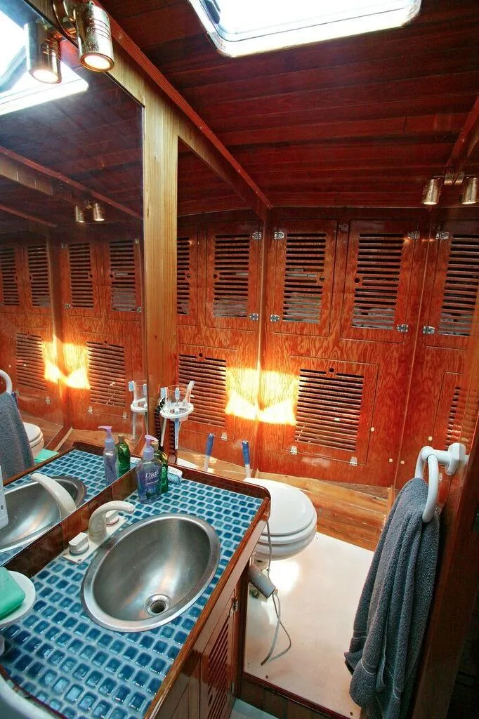 Slide: The Image of Luxurious wooden bathroom on a 1996 custom 100' sailing yacht. - 15