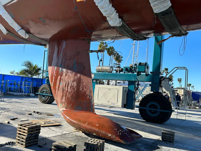 Slide: The Image of 1996 Custom 100' Sailing Yacht keel under maintenance in a shipyard. - 17