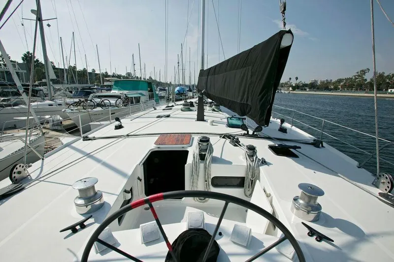 Slide: The Image of Custom 100' Sailing Yacht 1996, docked in a marina, view of deck and helm. - 19