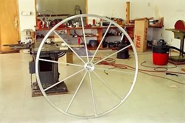 Slide: The Image of Large metal wheel in workshop for 1996 Custom 100' Sailing Yacht. - 21