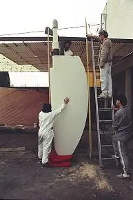 Slide: The Image of Workers assembling a 1996 Custom 100' Sailing Yacht rudder. - 22