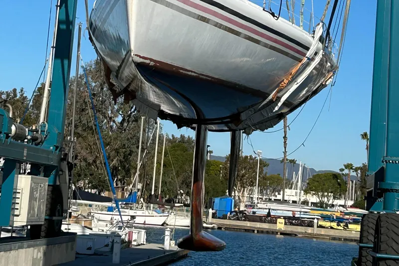 Slide: The Image of 1996 Custom 100' Sailing Yacht in dry dock for maintenance at marina. - 23