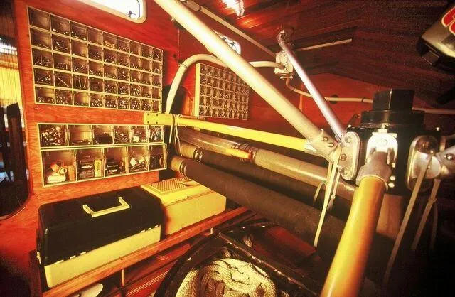 Slide: The Image of Interior of 1996 Custom 100' Sailing Yacht with organized storage and equipment. - 29