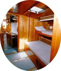 Slide: The Image of Interior cabin of a 1996 Custom 100' Sailing Yacht with wooden finishes. - 33