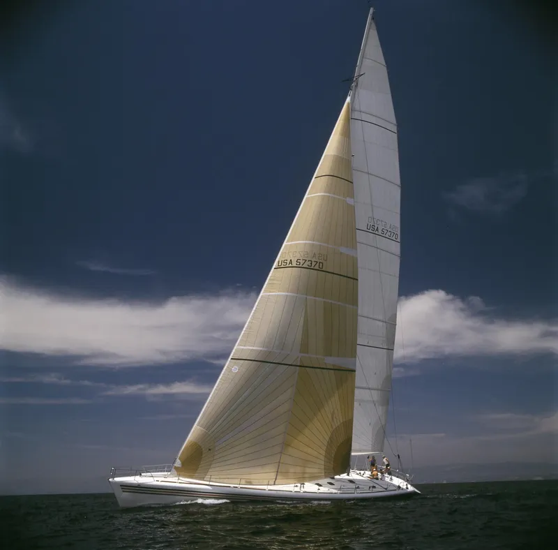 Slide: The Image of Custom 100' sailing yacht from 1996 on open water under clear skies. - 40