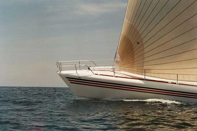 Slide: The Image of Custom 100' Sailing Yacht (1996) gliding on open sea with full sail. - 42