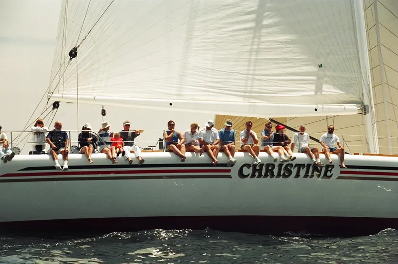Slide: The Image of Group of people sitting on a 1996 Custom 100' Sailing Yacht named "Christine." - 44