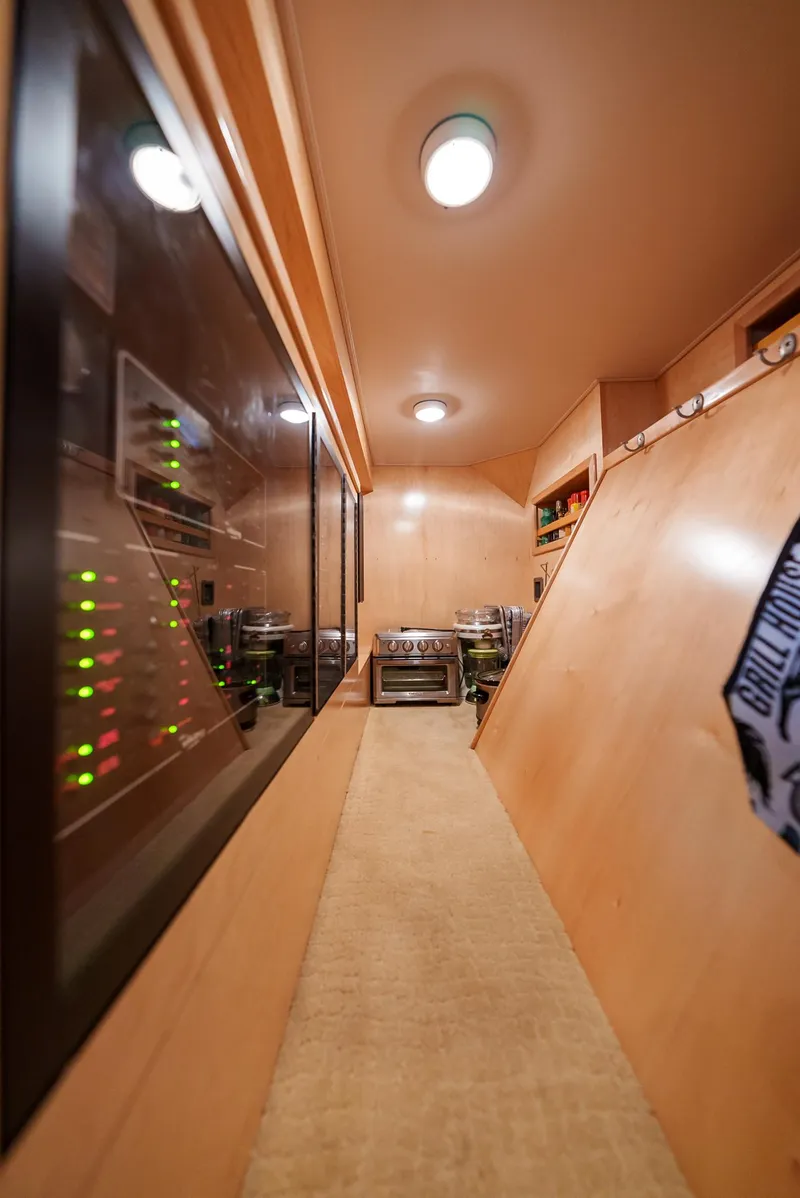 Slide: The Image of Interior of 2008 Viking 68 Skybridge yacht with control panels and equipment. - 10