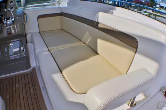 Slide: The Image of Luxurious seating on 2012 Sea Ray 540 Sundancer yacht with beige upholstery. - 13