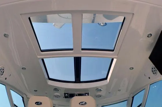 Slide: The Image of Interior view of 2012 Sea Ray 540 Sundancer with skylight and seating. - 19