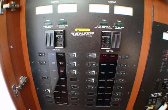 Slide: The Image of Electrical panel of 2012 Sea Ray 540 Sundancer yacht, featuring 240VAC and 120VAC switches. - 24