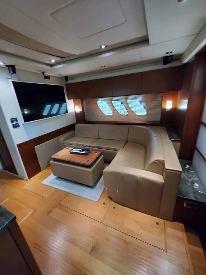 Slide: The Image of Luxurious interior of 2012 Sea Ray 540 Sundancer yacht with leather seating and modern amenities. - 27