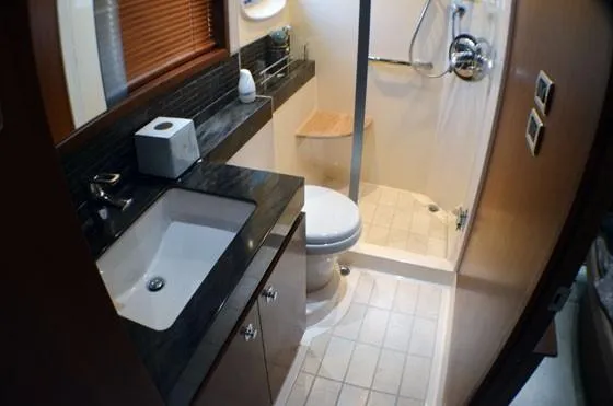 Slide: The Image of Luxurious bathroom in 2012 Sea Ray 540 Sundancer yacht with modern fixtures. - 37