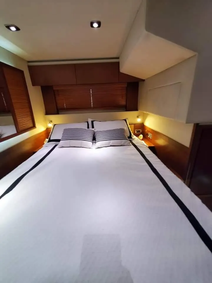 Slide: The Image of Luxurious bedroom interior of 2012 Sea Ray 540 Sundancer yacht with modern design. - 40