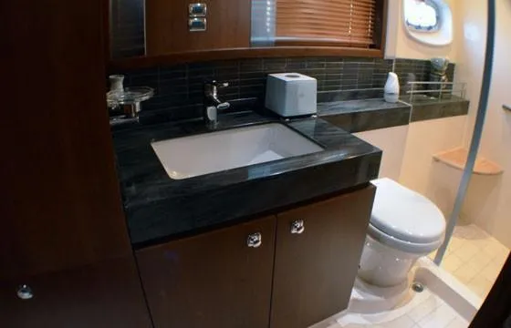 Slide: The Image of Luxurious bathroom in 2012 Sea Ray 540 Sundancer yacht with modern fixtures. - 42