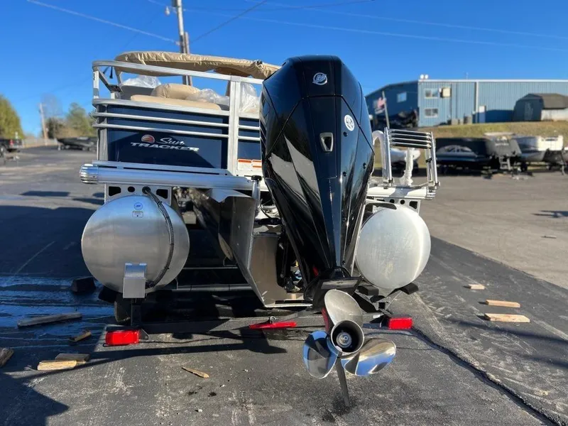 Slide: The Image of 2023 Sun Tracker FISHIN' BARGE® 22 XP3 pontoon boat with outboard motor. - 5