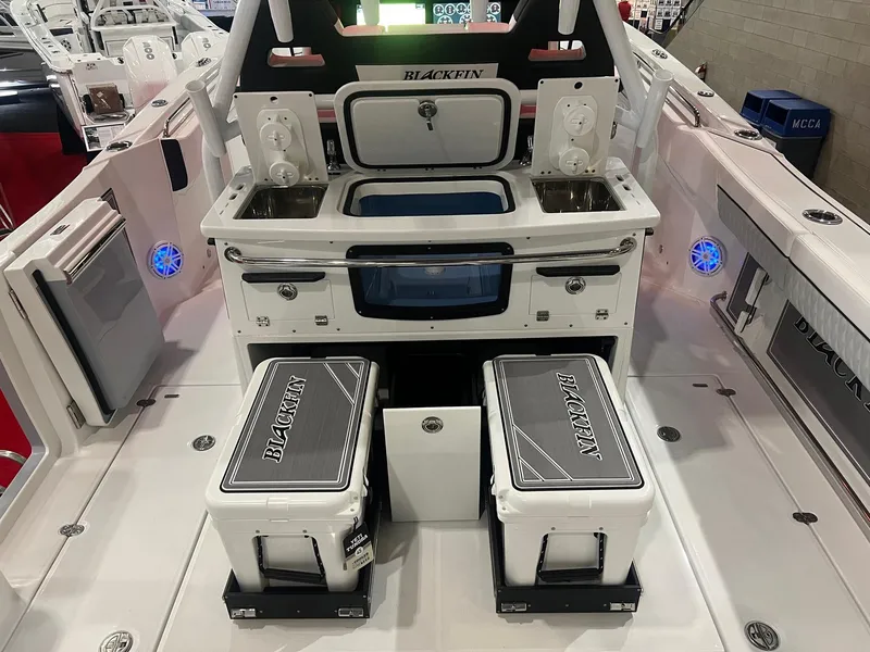 Slide: The Image of 2023 Blackfin 332 CC boat interior with storage and seating features. - 14
