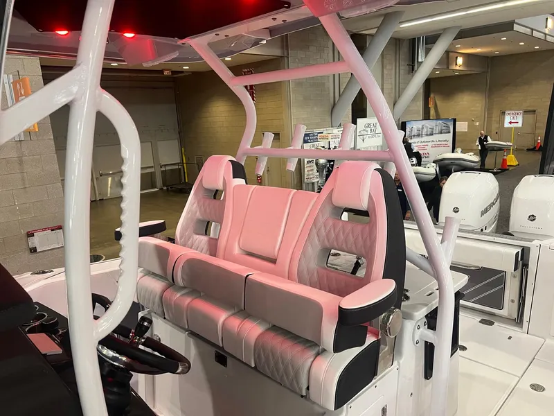 Slide: The Image of 2023 Blackfin 332 CC boat interior with modern seating and helm. - 16