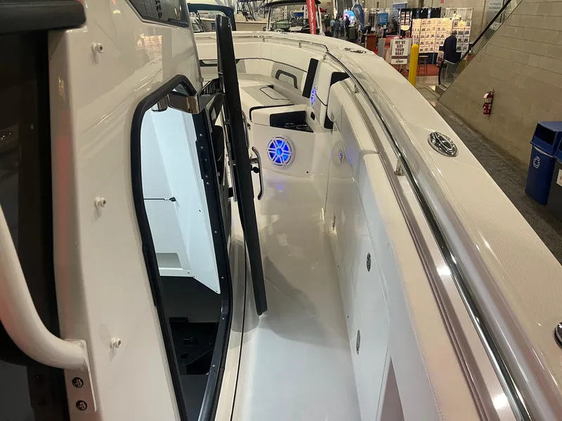 Slide: The Image of 2023 Blackfin 332 CC boat interior with sleek design and modern features. - 20