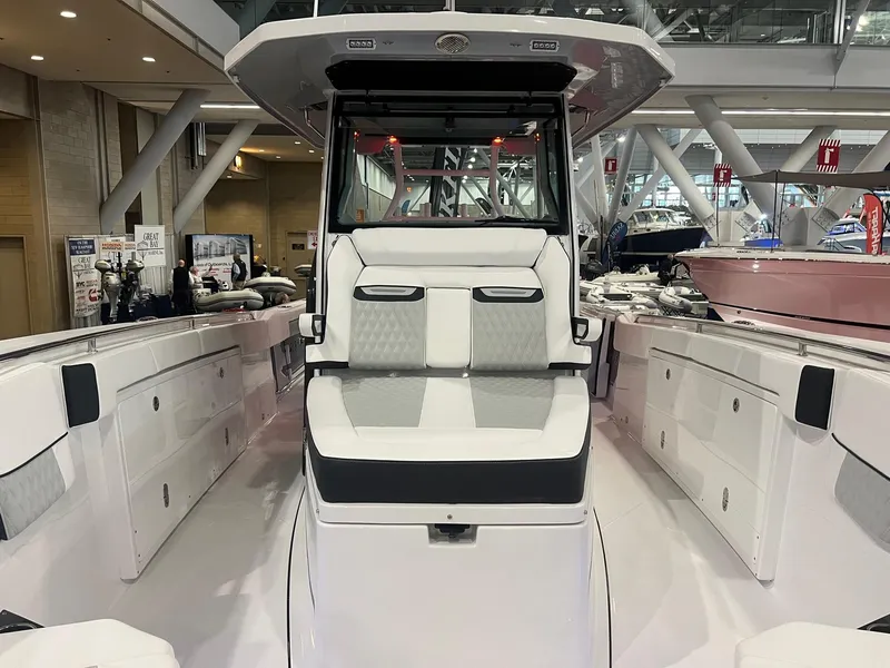 Slide: The Image of 2023 Blackfin 332 CC boat interior with sleek seating and modern design. - 27