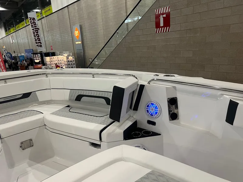 Slide: The Image of 2023 Blackfin 332 CC boat interior with seating and speaker system. - 34